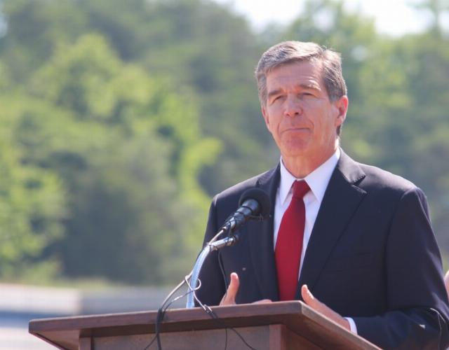 <p><em>Image: Roy Cooper. Credit: NCDOTcommunications via <a data-cke-saved-href=